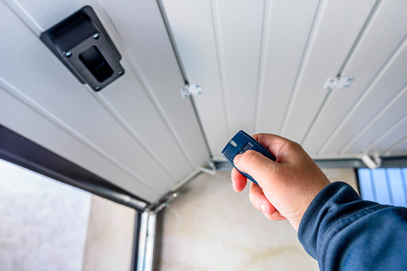 renovation-energetique-pose-porte-garage-maisons-quality